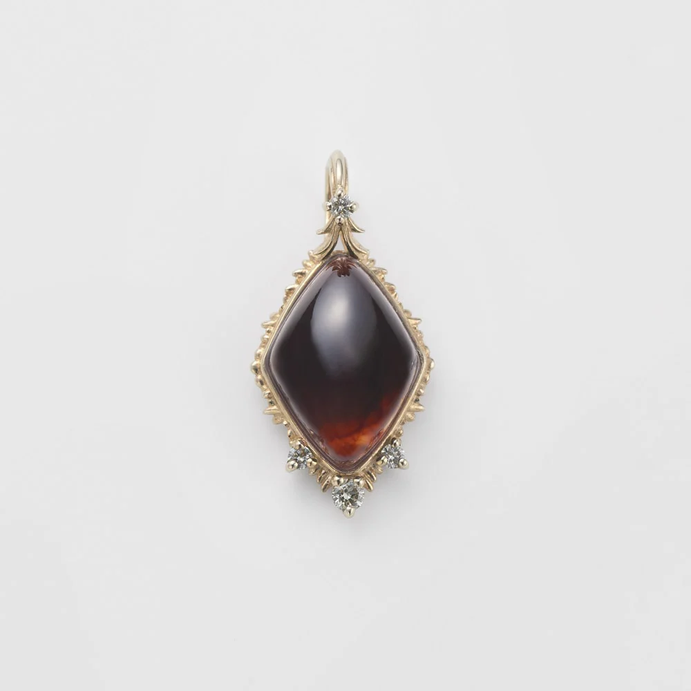 K10 Amber Charm